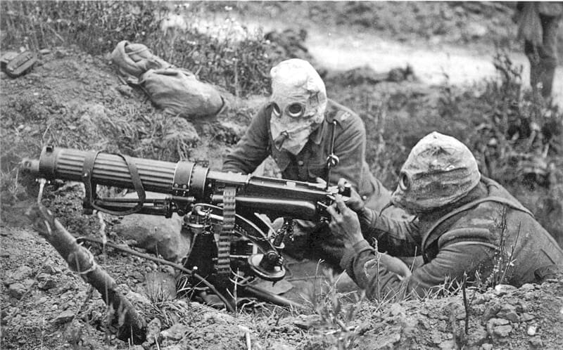 vickers machine gun crew with gas masks
